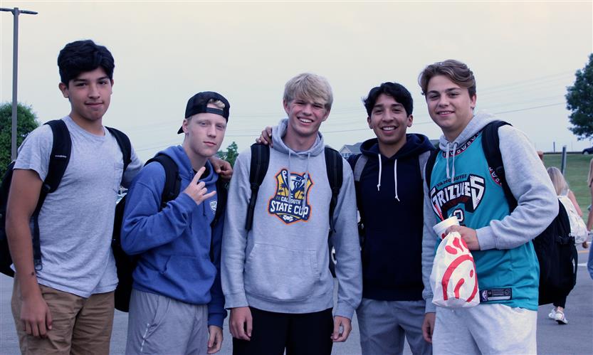 A group of students smile
